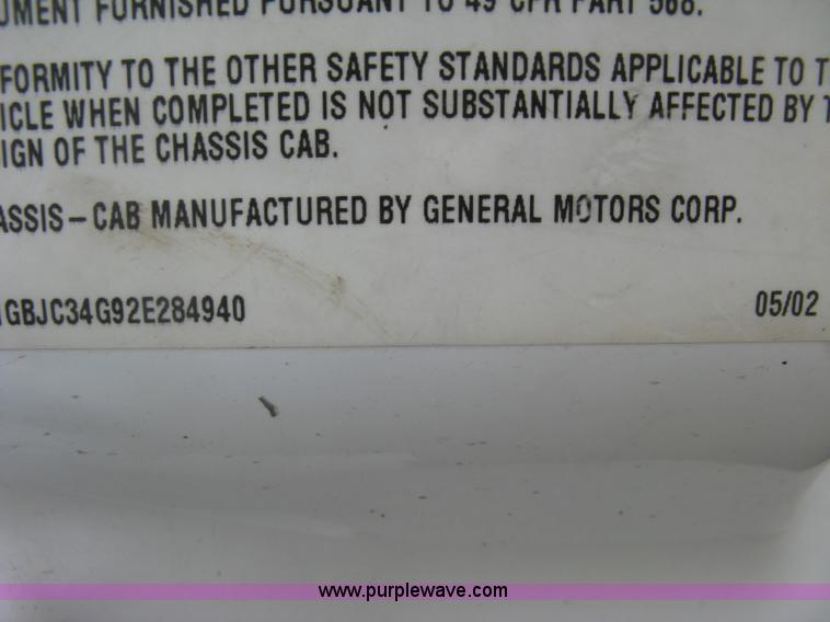 image for item E7878 2002 Chevrolet Silverado 3500 flatbed dump truck