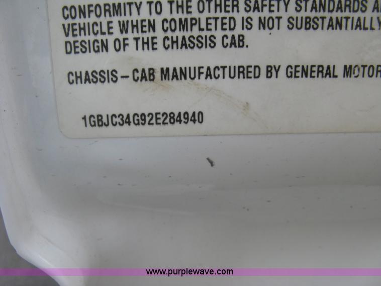 image for item E7878 2002 Chevrolet Silverado 3500 flatbed dump truck