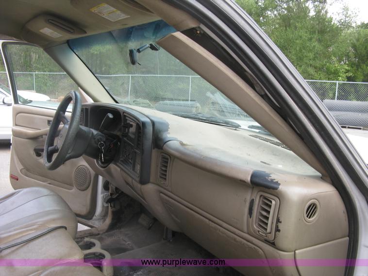 image for item E7878 2002 Chevrolet Silverado 3500 flatbed dump truck