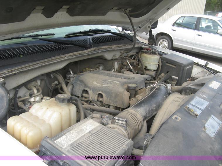 image for item E7878 2002 Chevrolet Silverado 3500 flatbed dump truck