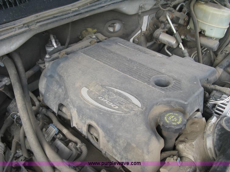 image for item E7878 2002 Chevrolet Silverado 3500 flatbed dump truck