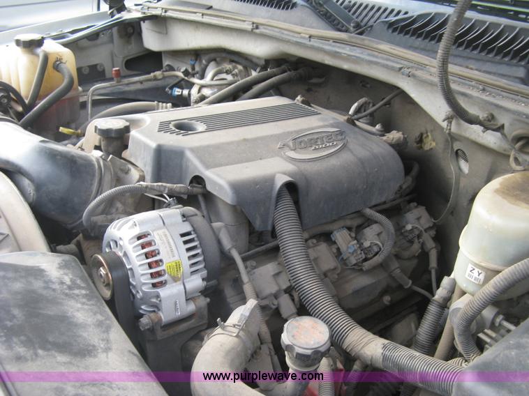 image for item E7878 2002 Chevrolet Silverado 3500 flatbed dump truck