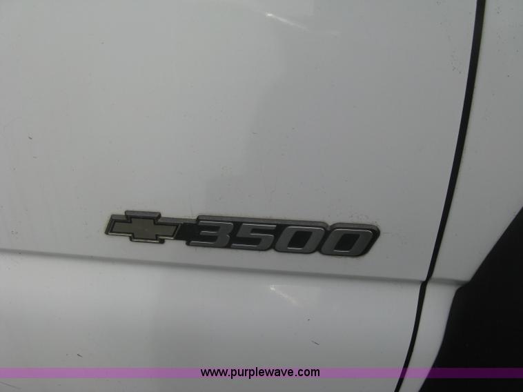 image for item E7878 2002 Chevrolet Silverado 3500 flatbed dump truck
