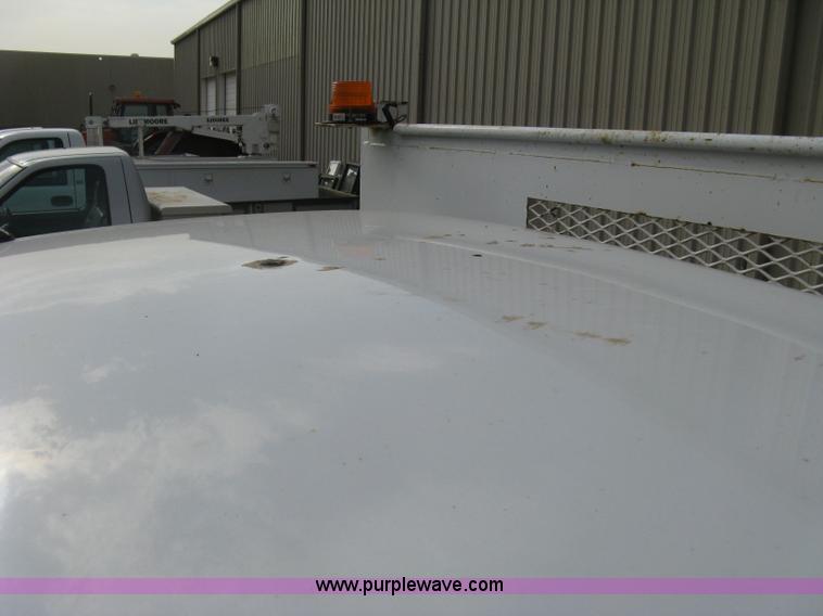 image for item E7878 2002 Chevrolet Silverado 3500 flatbed dump truck