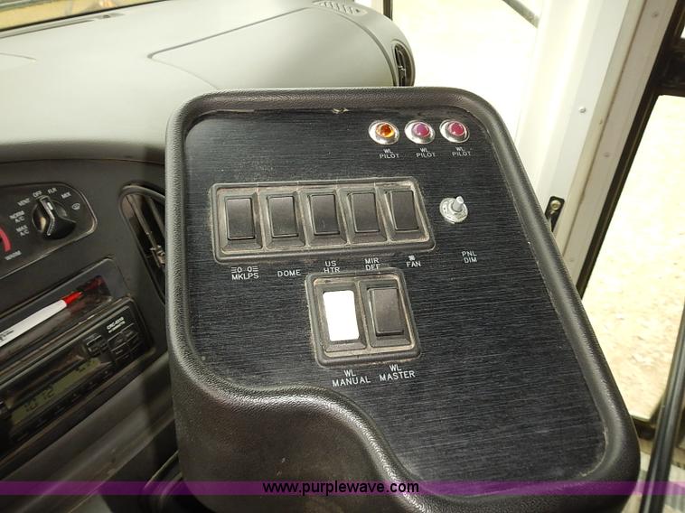 image for item J3056 2004 Ford 801 school bus