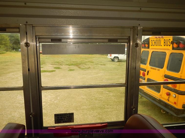 image for item J3056 2004 Ford 801 school bus