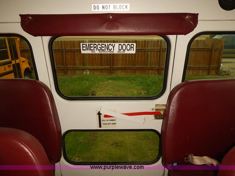 image for item J3056 2004 Ford 801 school bus