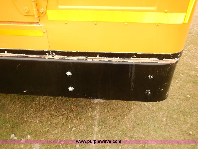 image for item J3056 2004 Ford 801 school bus