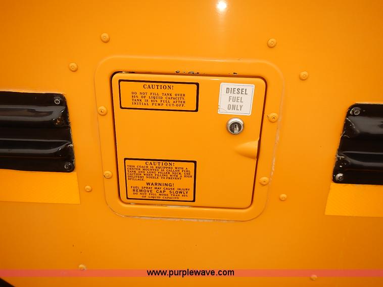 image for item J3056 2004 Ford 801 school bus