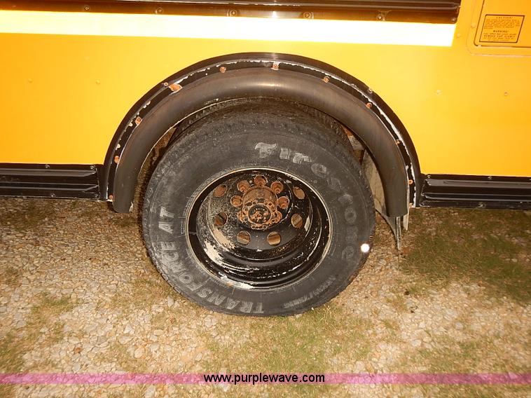 image for item J3056 2004 Ford 801 school bus