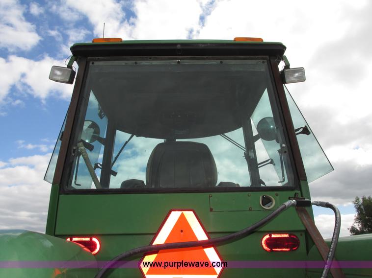 image for item G9943 1976 John Deere 8430 4WD tractor