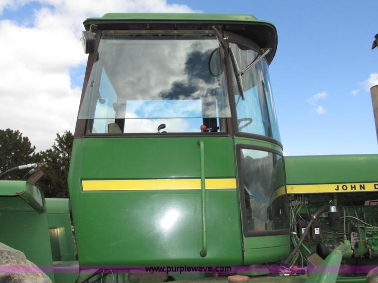 image for item G9943 1976 John Deere 8430 4WD tractor