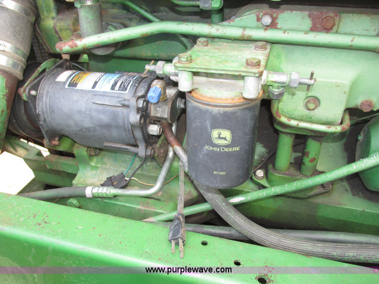 image for item G9943 1976 John Deere 8430 4WD tractor