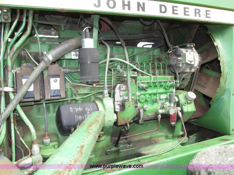 image for item G9943 1976 John Deere 8430 4WD tractor