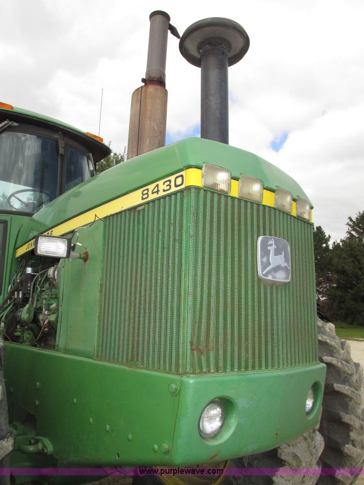 image for item G9943 1976 John Deere 8430 4WD tractor