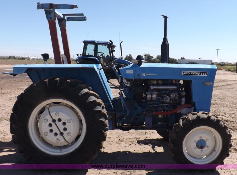 image for item H9138 Rhino 554 MFWD tractor