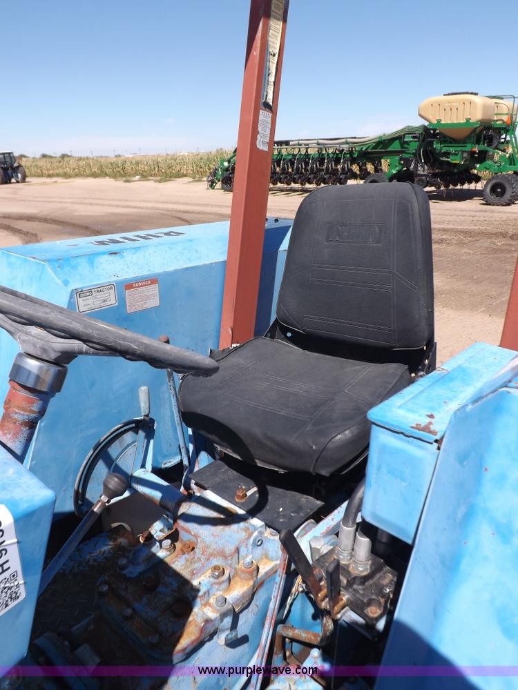 image for item H9138 Rhino 554 MFWD tractor