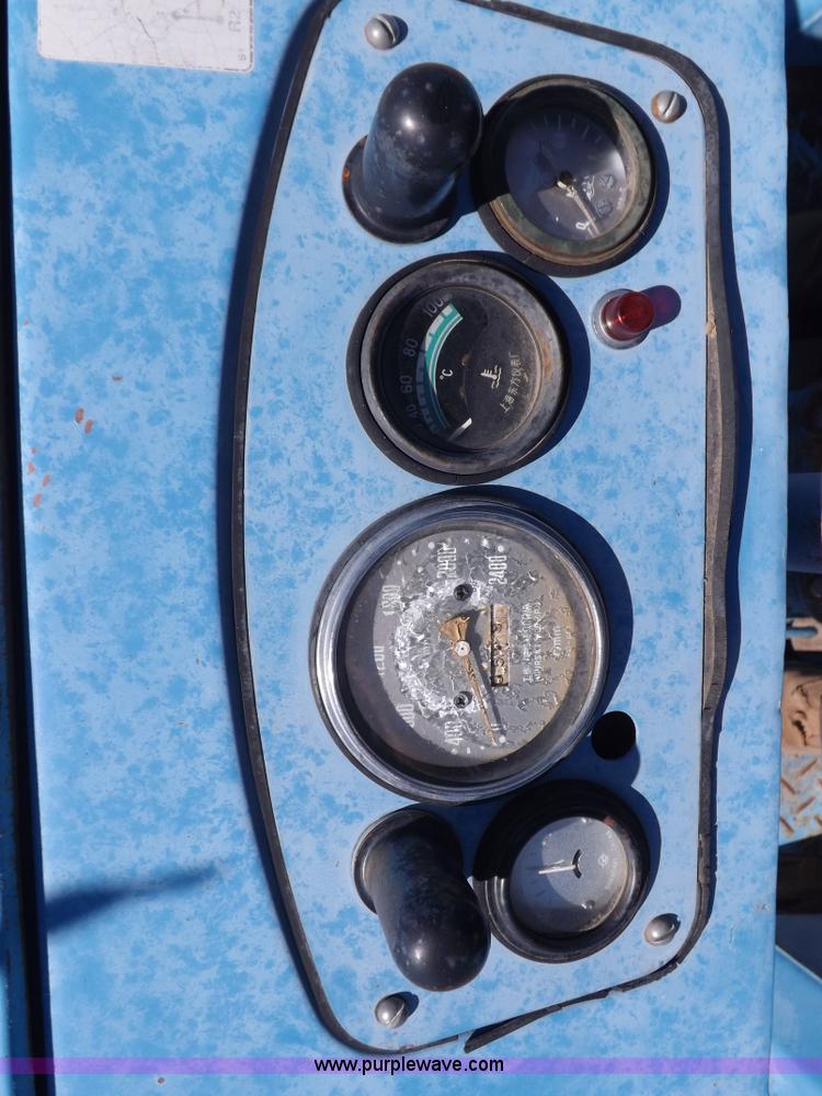 image for item H9138 Rhino 554 MFWD tractor