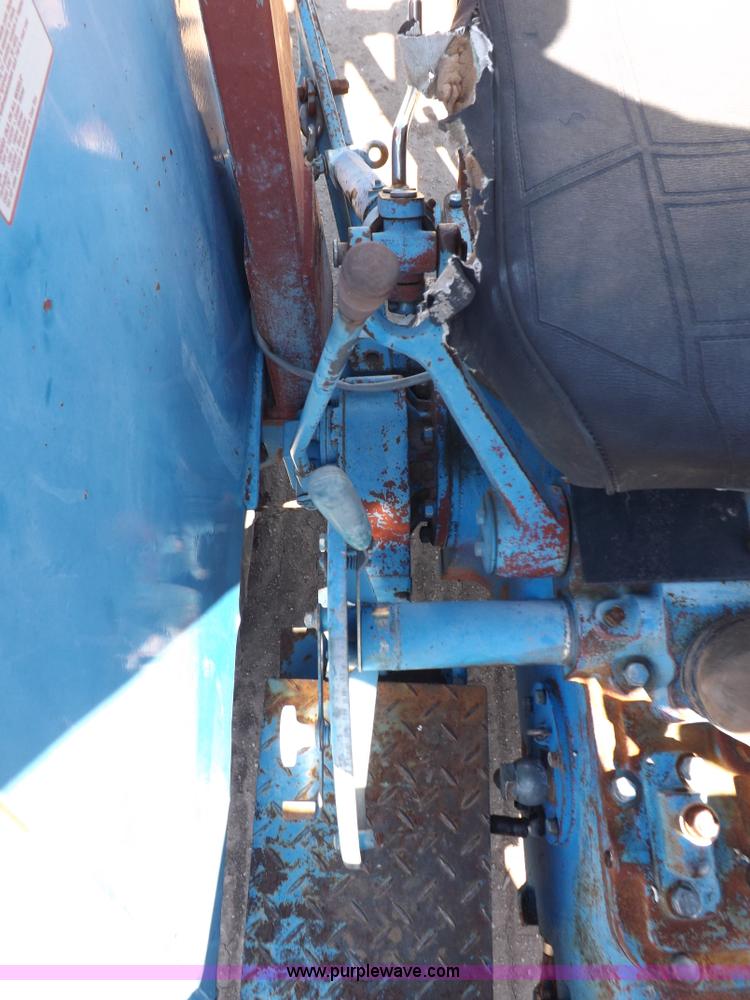 image for item H9138 Rhino 554 MFWD tractor