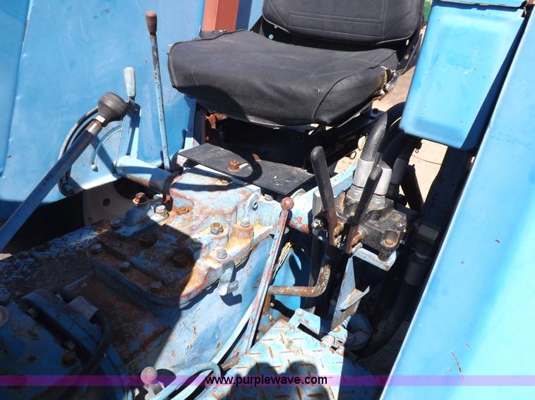 image for item H9138 Rhino 554 MFWD tractor