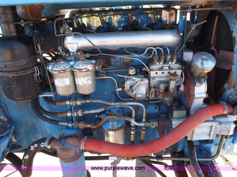 image for item H9138 Rhino 554 MFWD tractor