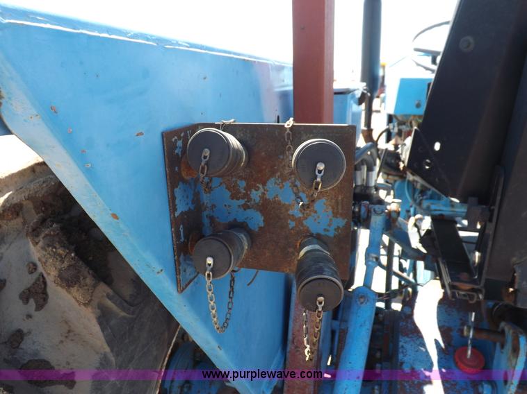 image for item H9138 Rhino 554 MFWD tractor