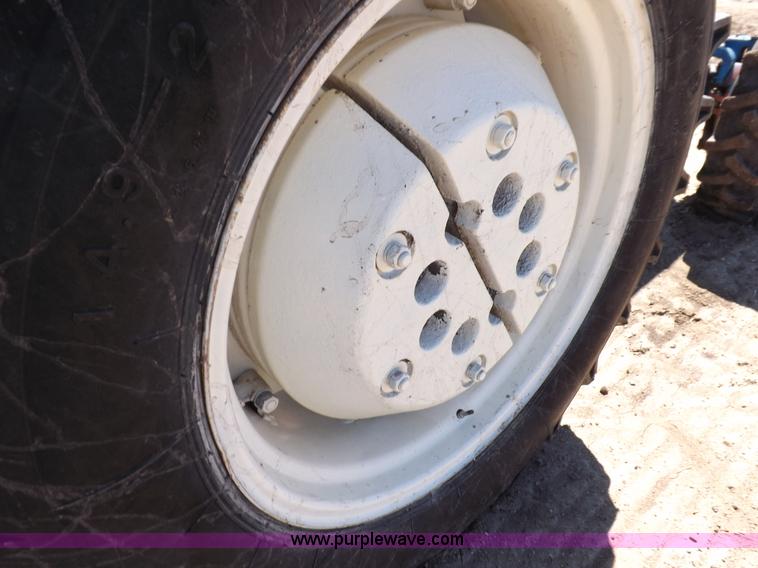 image for item H9138 Rhino 554 MFWD tractor