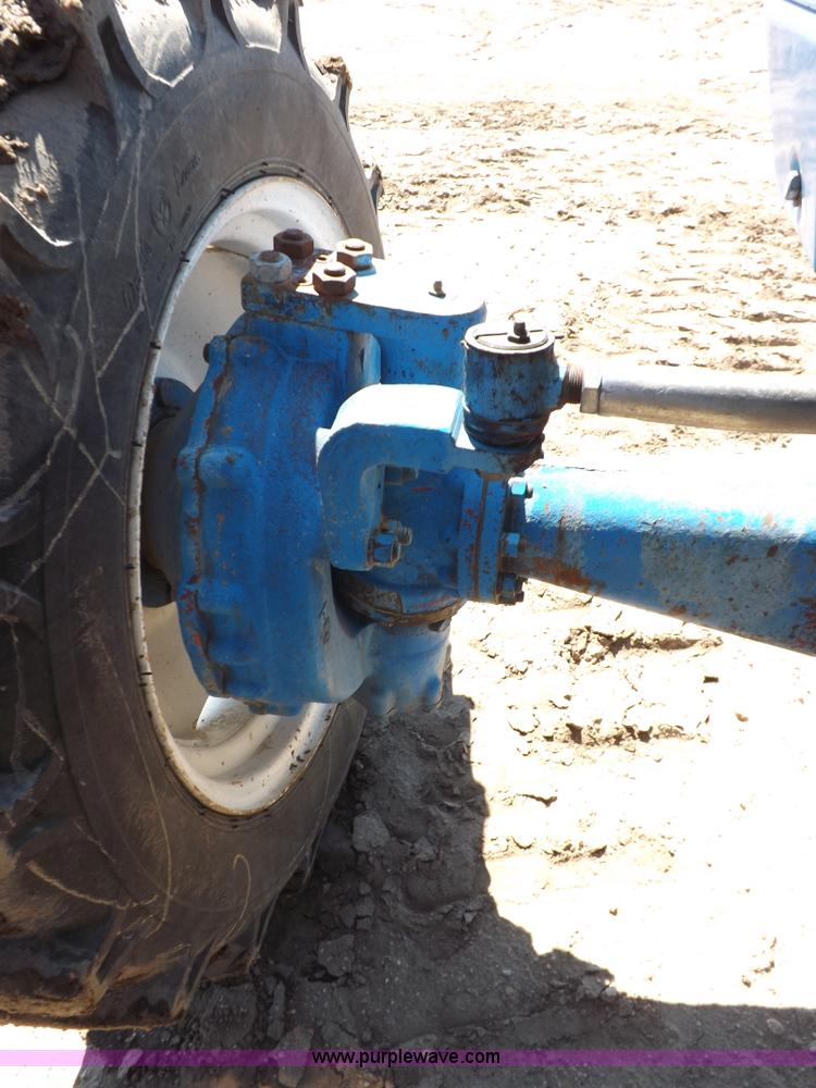 image for item H9138 Rhino 554 MFWD tractor