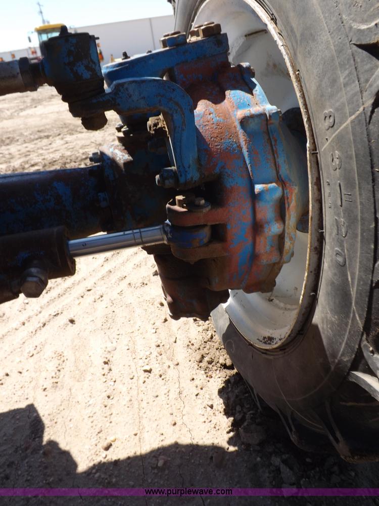 image for item H9138 Rhino 554 MFWD tractor