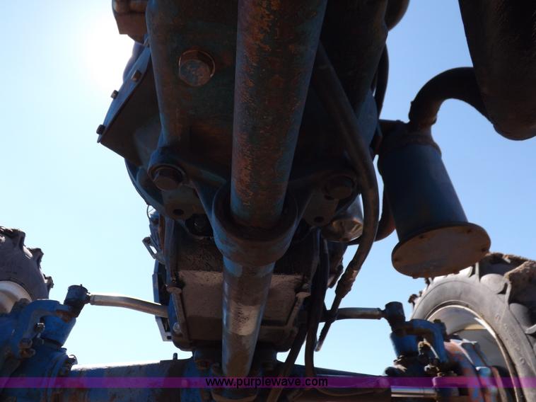 image for item H9138 Rhino 554 MFWD tractor