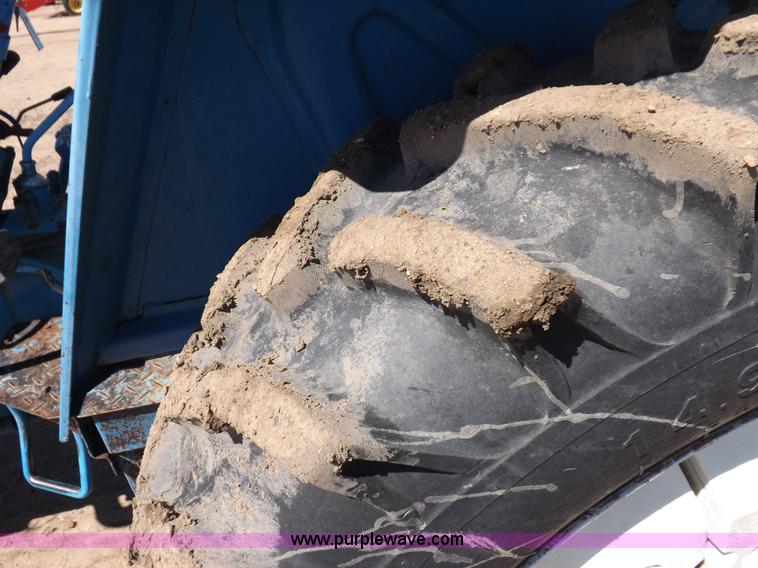 image for item H9138 Rhino 554 MFWD tractor