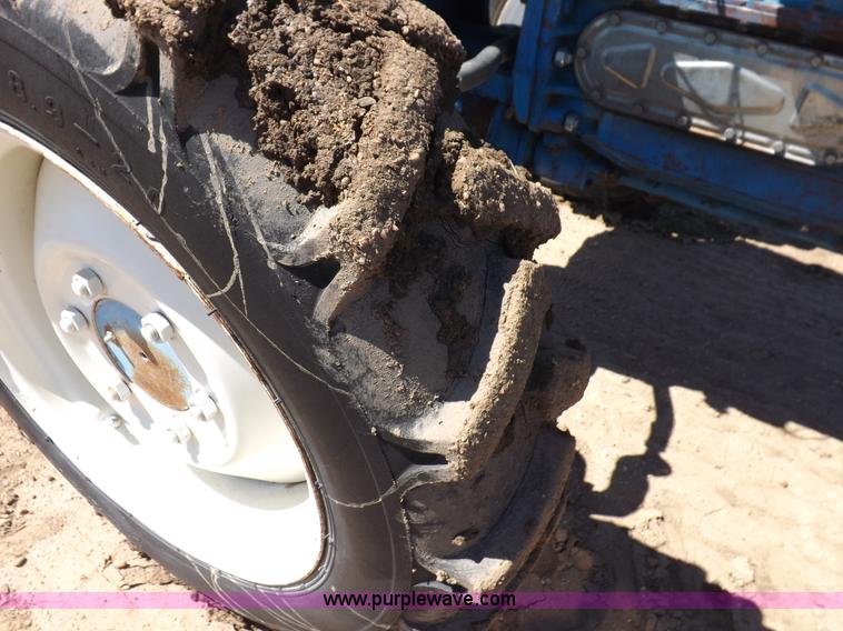 image for item H9138 Rhino 554 MFWD tractor