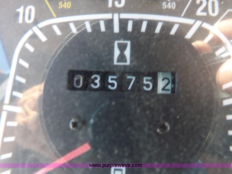 image for item H9139 2001 New Holland TS110 MFWD tractor