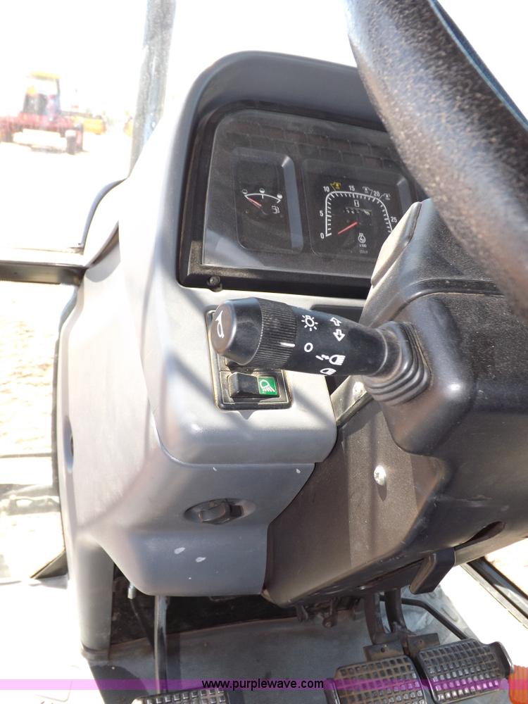 image for item H9139 2001 New Holland TS110 MFWD tractor