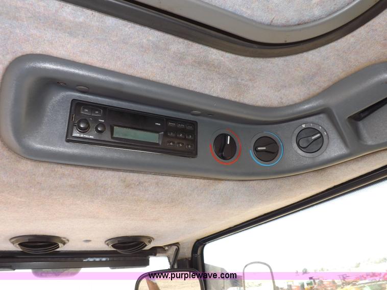 image for item H9139 2001 New Holland TS110 MFWD tractor