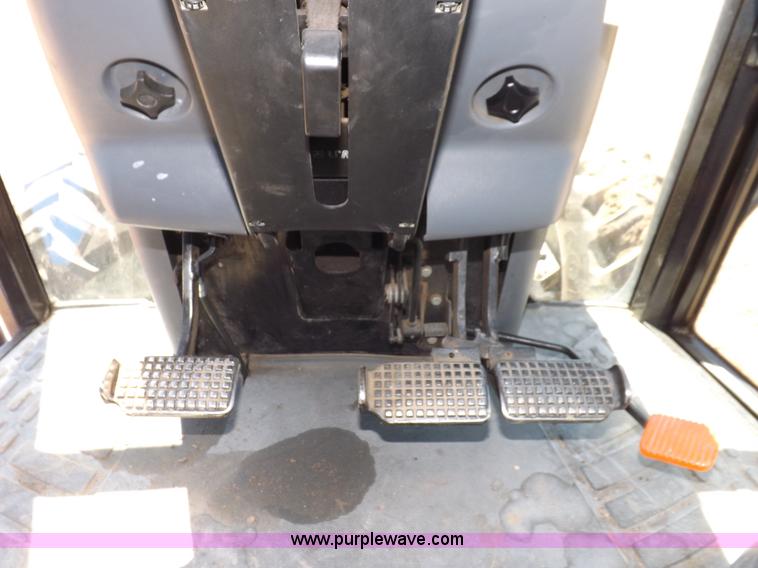 image for item H9139 2001 New Holland TS110 MFWD tractor