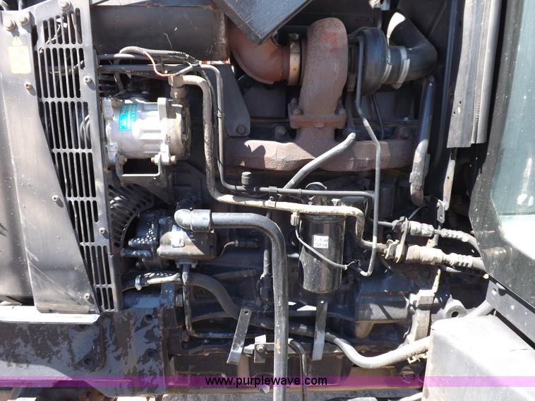 image for item H9139 2001 New Holland TS110 MFWD tractor