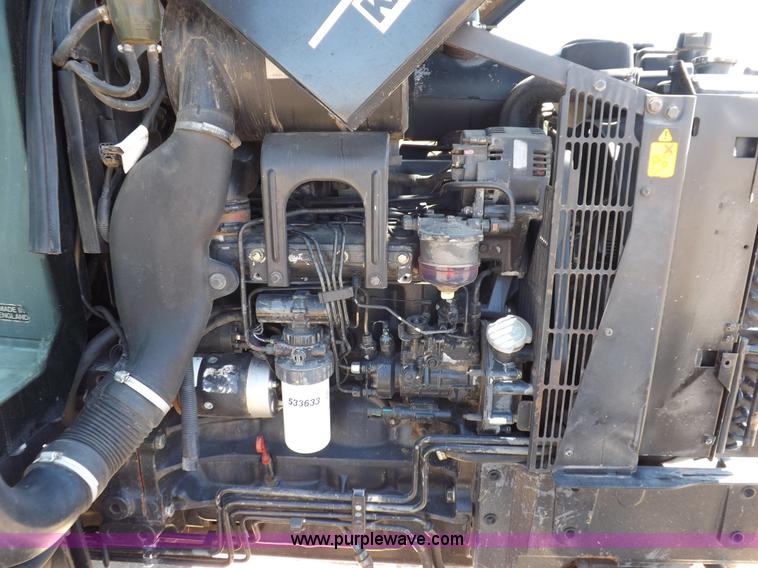 image for item H9139 2001 New Holland TS110 MFWD tractor