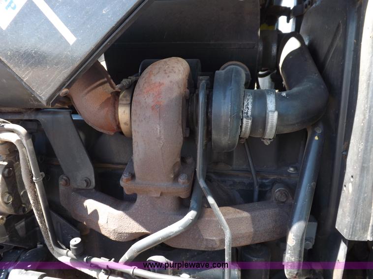 image for item H9139 2001 New Holland TS110 MFWD tractor