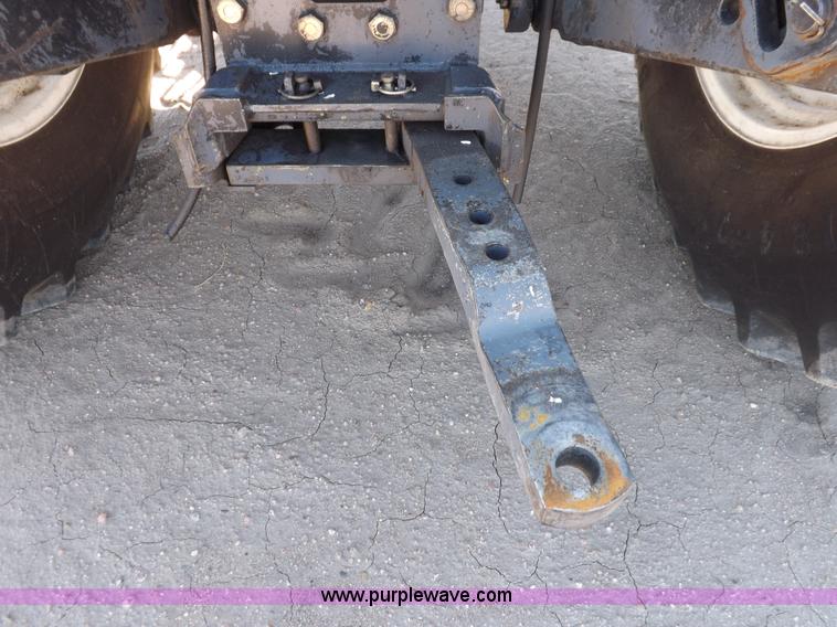 image for item H9139 2001 New Holland TS110 MFWD tractor