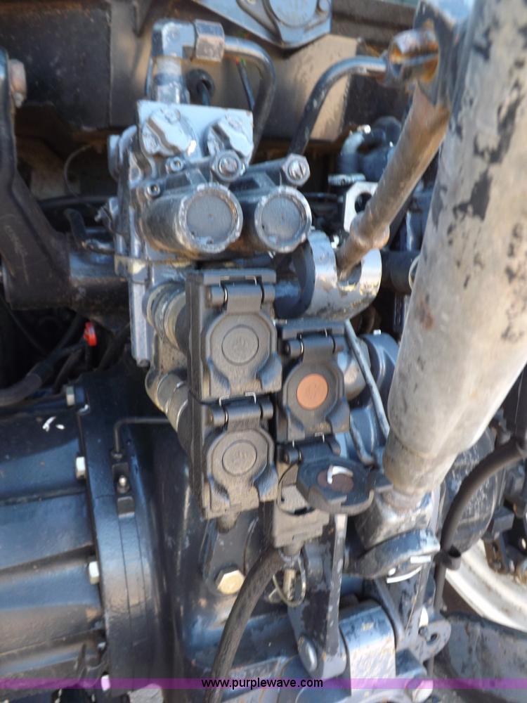 image for item H9139 2001 New Holland TS110 MFWD tractor