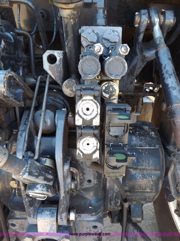 image for item H9139 2001 New Holland TS110 MFWD tractor