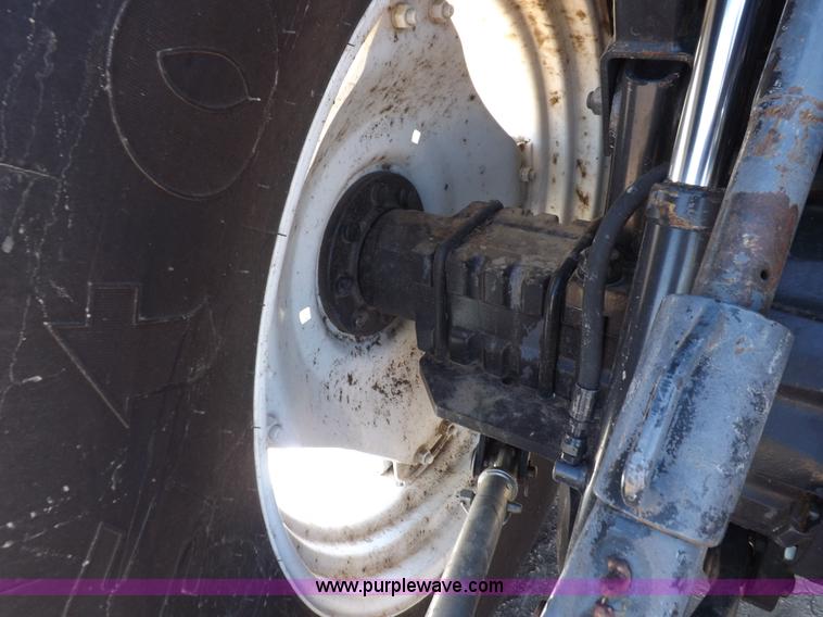 image for item H9139 2001 New Holland TS110 MFWD tractor