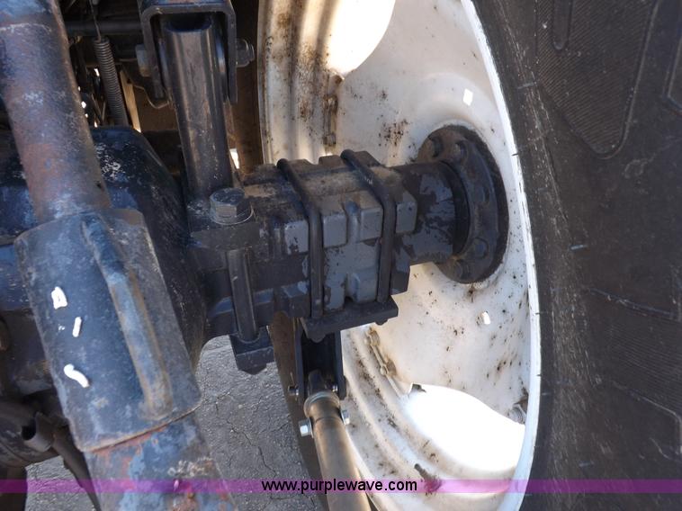 image for item H9139 2001 New Holland TS110 MFWD tractor