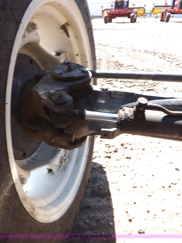 image for item H9139 2001 New Holland TS110 MFWD tractor