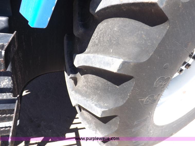 image for item H9139 2001 New Holland TS110 MFWD tractor