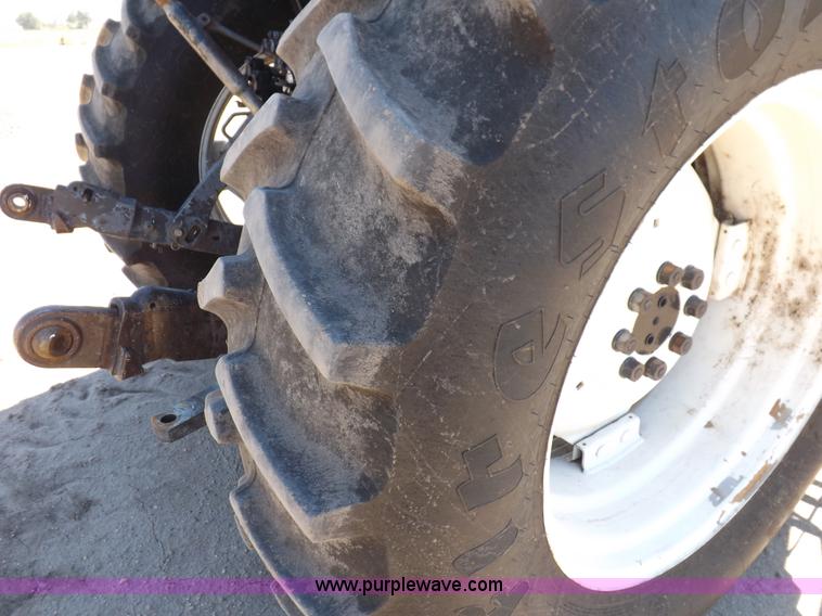 image for item H9139 2001 New Holland TS110 MFWD tractor