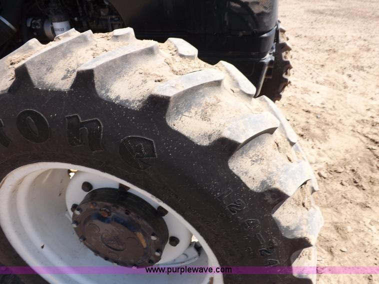 image for item H9139 2001 New Holland TS110 MFWD tractor