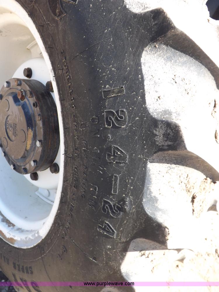 image for item H9139 2001 New Holland TS110 MFWD tractor