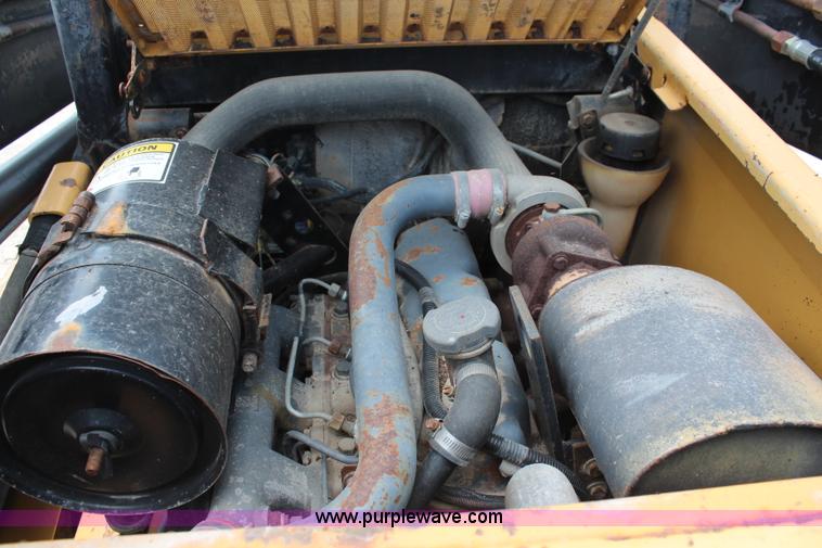 image for item J2042 1995 New Holland LX885 skid steer